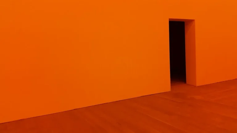 Orange room with an open doorway