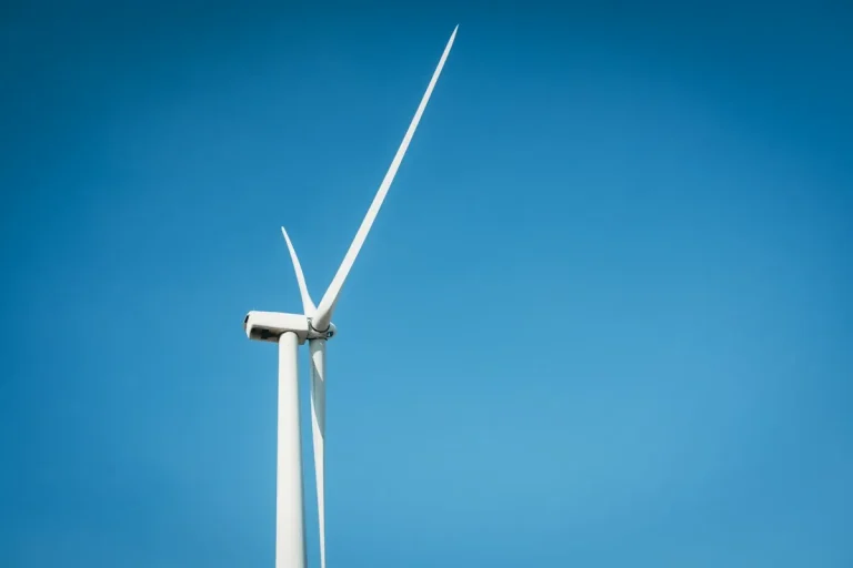 Wind turbine against a blue sky